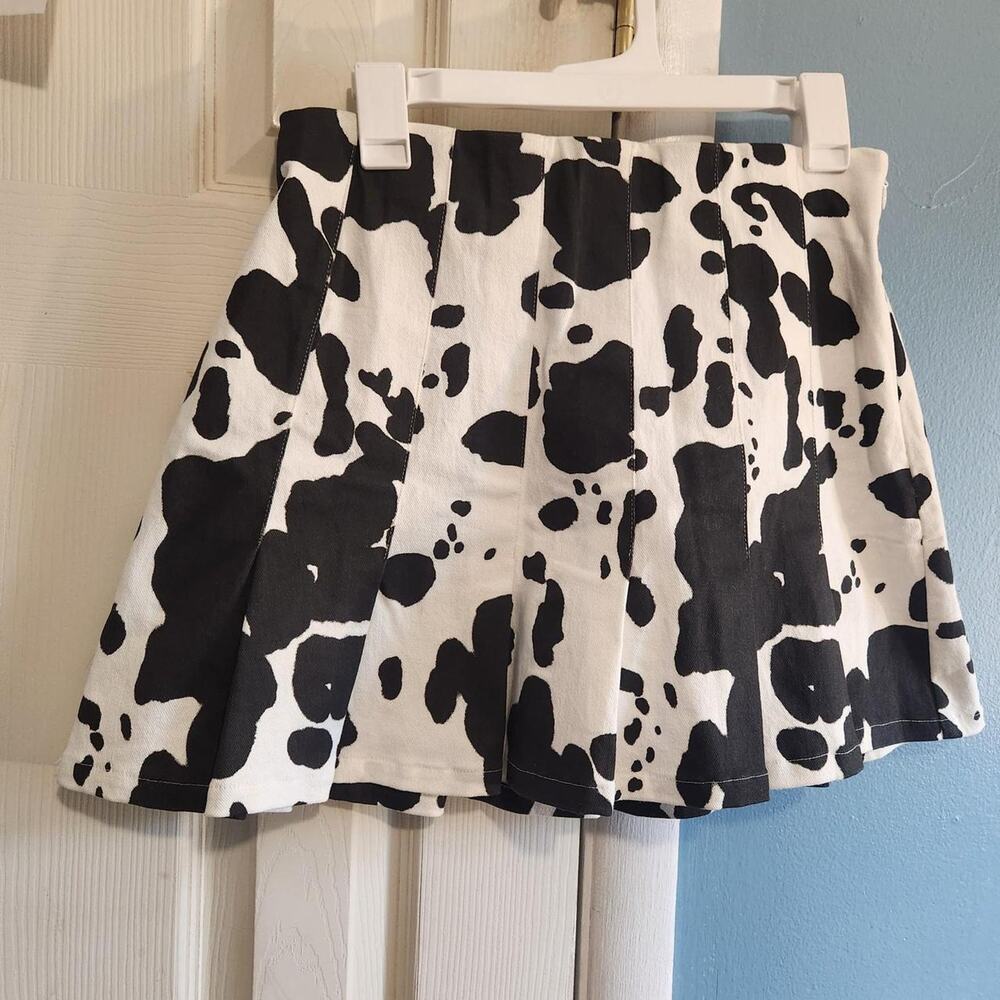 En Saison black and white cow print mini skirt in a M Cow print Well made
